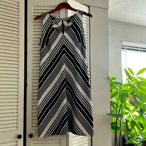 Black and white striped dress. Beautiful for summer outing. Size S. Cute clasp.